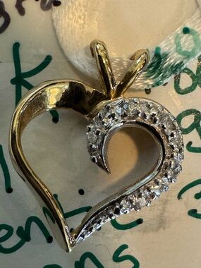 14k authentic yellow and white Gold with authentic diamonds stamp and test acid